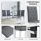 Chaise de salle à manger grise sans accoudoirs, avec dossier capitonné à motif quadrillé et clouté, et pieds en métal argenté.
