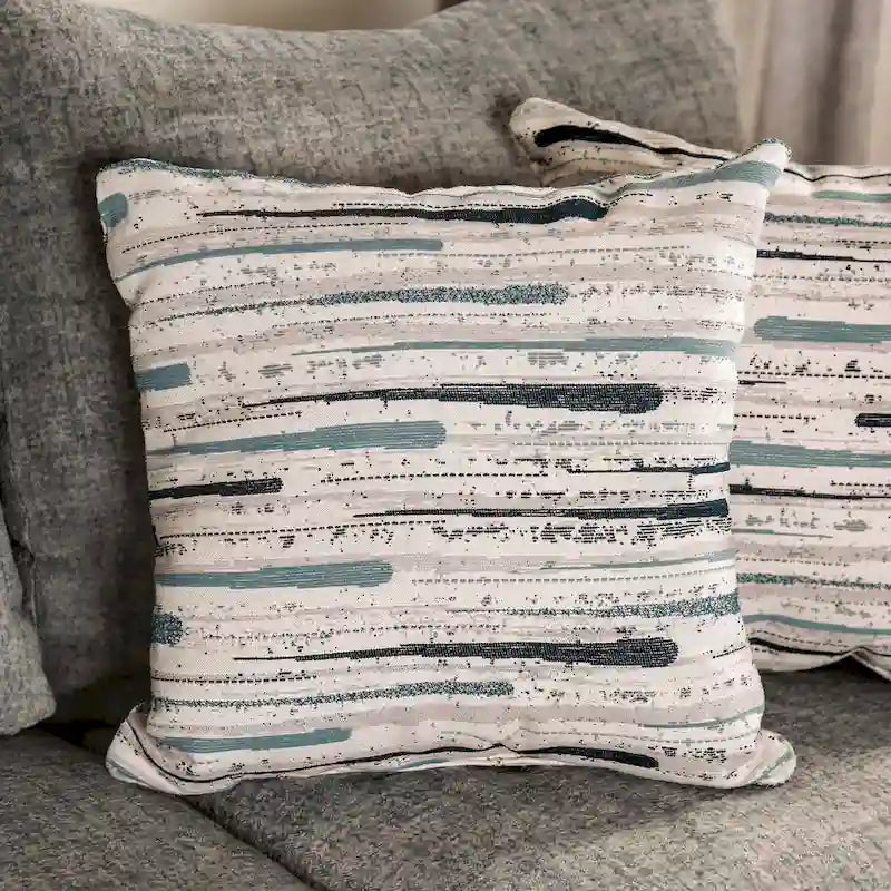 Canapé transitoire en tissu gris avec accoudoirs évasés et coussins de siège à ressorts