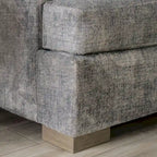 Canapé transitoire en tissu gris avec accoudoirs évasés et coussins de siège à ressorts