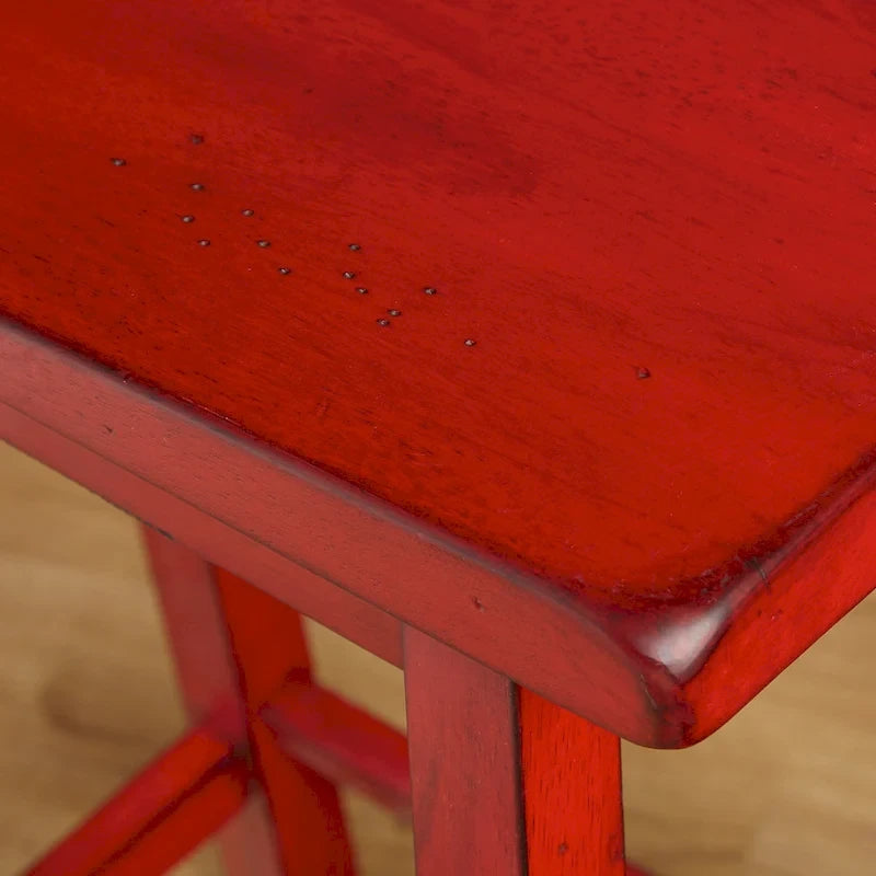 Tabouret de bar rustique sans dossier en hévéa, hauteur comptoir, avec assise en forme de selle
