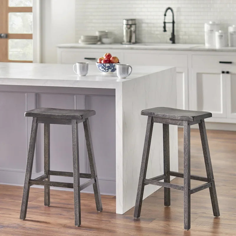 Tabouret de bar rustique sans dossier en hévéa, hauteur comptoir, avec assise en forme de selle