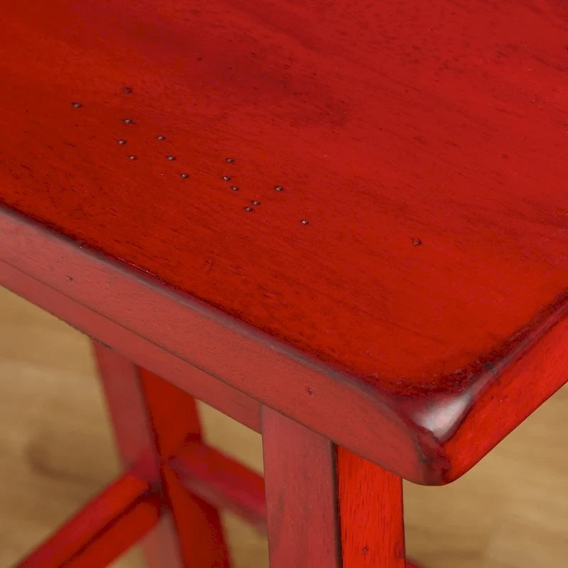 Tabouret de bar rustique sans dossier en hévéa, hauteur comptoir, avec assise en forme de selle