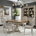 Table à manger ovale sur pied blanc antique avec plateau effet châtaignier vieilli