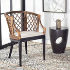 Fauteuil en rotin tressé avec coussin blanc, finition lavis naturel