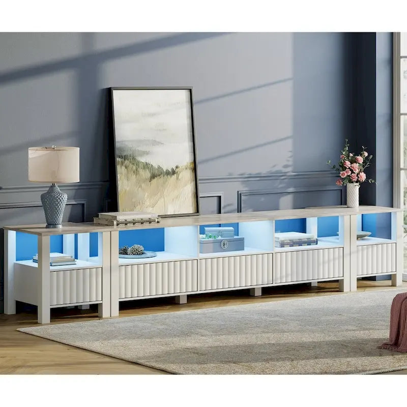 Meuble TV blanc cannelé en bois avec plateau à motif de pierre et lumière LED RGB