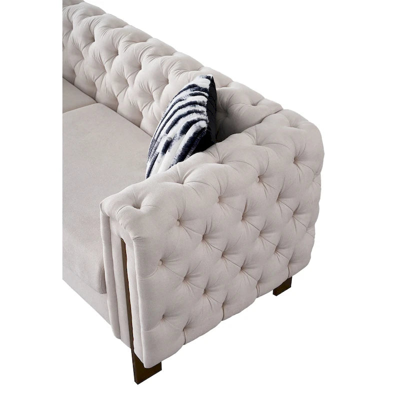 Canapé Chesterfield capitonné en velours avec pieds en métal doré