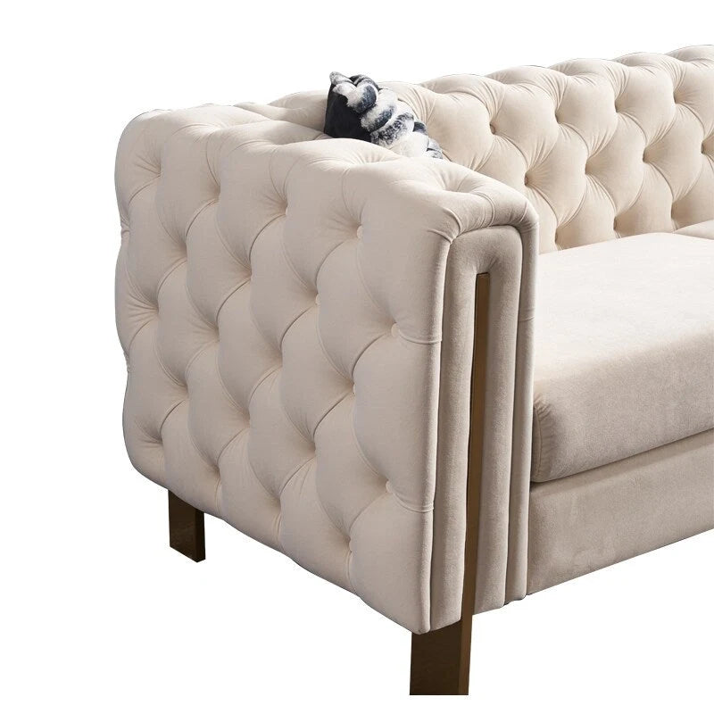 Canapé Chesterfield capitonné en velours avec pieds en métal doré