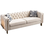 Canapé Chesterfield capitonné en velours avec pieds en métal doré