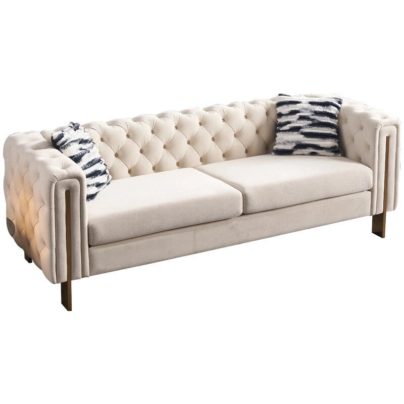 Canapé Chesterfield capitonné en velours avec pieds en métal doré