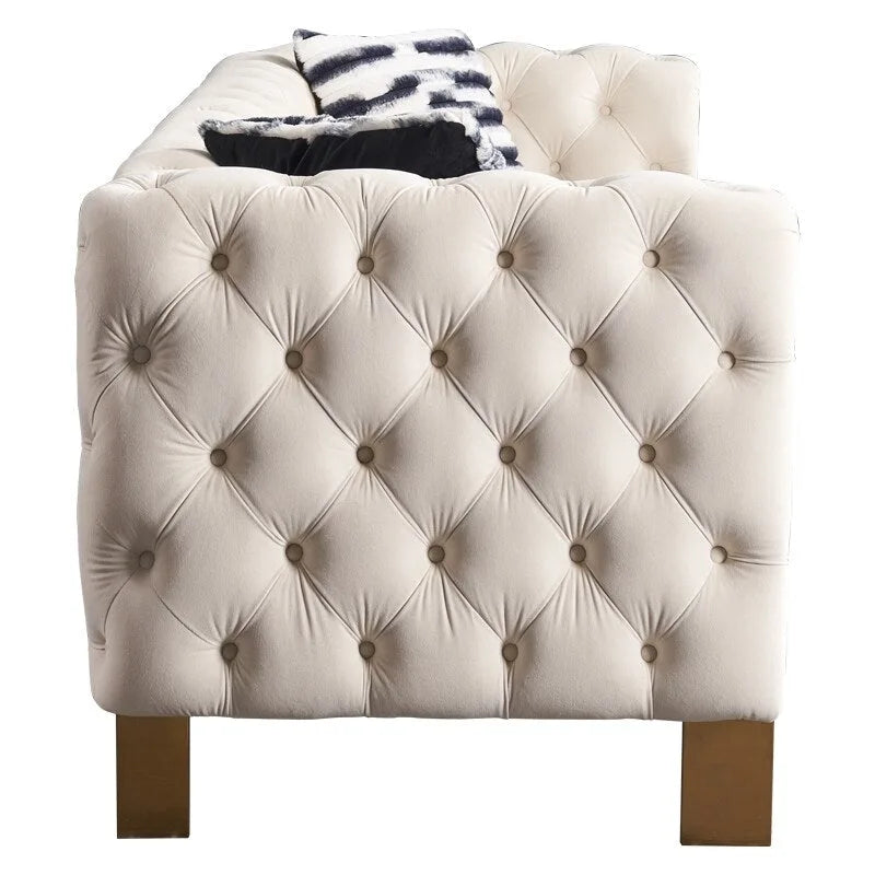 Canapé Chesterfield capitonné en velours avec pieds en métal doré
